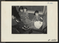[recto] Lone Pine, Calif.--Mother and child evacuees of Japanese descent on train en route to War Relocation Authority center at Manzanar, California. ;  Photographer: Albers, Clem ;  Lone Pine, California.