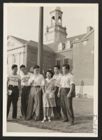 [recto] University of Connecticut, Storrs, Connecticut, campus group (evacuees only). Left to right: Jim Nakana (Topaz--Redwood City, Calif.); Tokuji Furuta (Poston--San ...