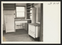 [recto] Kitchen alcove of apartment in Warner Gardens housing project at Waterbury, Connecticut. At present (July 1) there are 38 vacancies ...