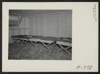 [recto] This picture shows view of apartment. WRA furnishes sleeping equipment, only other thing furnished is a light globe. ;  Photographer: Stewart, Francis ;  Hunt, Idaho.
