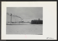 [recto] A wintry view, showing fire department No. 1 on the right with the hospital in the background. ;  Photographer: Stewart, Francis ;  Newell, California.