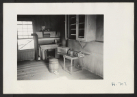 [recto] Evacuee property. A deserted house which was formerly occupied by a farmer family of Japanese descent. When this family was evacuated they left all but the basic necessities of life. ;  Photographer: Stewart, Francis ;  Loomis, California.