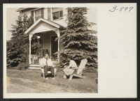 [recto] Mr. and Mrs. Frank Matsuuichi in front of the house which they share with other employees of the Old Lyme ...