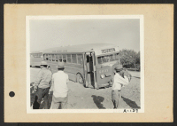 [recto] Poston, Ariz.--This bus, bringing evacuees of Japanese ancestry to the Colorado River War Relocation Authority center has become sand-bound near its destination. ;  Photographer: Clark, Fred ;  Poston, Arizona.