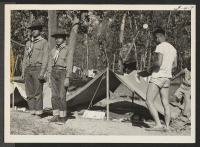 [recto] A 5-day Boy Scout Camp on the bank of the Mississippi River was composed of nearly a hundred boys from the Rohwer Center, a few less from the Jerome Center, together with a small group from the nearby town of Arkansas City. ;  McGehee, Arkansas.