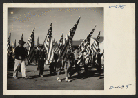 [recto] A view of some of the school children who participated in the Harvest Festival Parade at the Gila River Center on Thanksgiving day. ;  Photographer: Stewart, Francis ;  Rivers, Arizona.