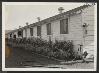 [recto] Side view of Butte Administration Building. ;  Rivers, Arizona.