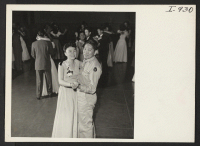 [recto] Amy Watanabe of Denver and Pfc. James Maeda, Fitzsimons General Hospital, Denver, at an annual semi-formal dance sponsored by the ...