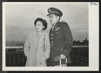 [recto] Mrs. Duayne M. Kimball of 820 Humboldt Street greets her brother, 1st Lt. Howard Y. Miyake, wounded Japanese war veteran, ...