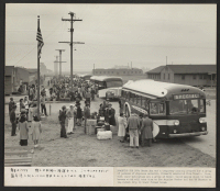 [recto] At the Santa Ana temporary housing project a group of persons of Japanese ancestry, formerly evacuated from Hawaii, are gathered ...
