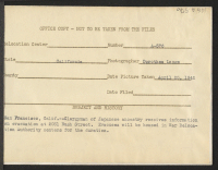 [verso] Clergyman of Japanese ancestry receives information on evacuation at 2031 Bush Street. Evacuees will be housed in War Relocation Authority centers for the duration. ;  Photographer: Lange, Dorothea ;  San Francisco, California.