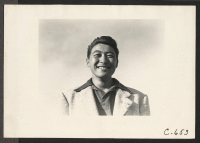 [recto] Tanforan Assembly Center, San Bruno, Calif.--Portrait of evacuee of Japanese ancestry from a farming district in central California. ;  Photographer: Lange, Dorothea ;  San Bruno, California.