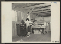 [recto] Manzanar, Calif.--The Manzanar Free Press, the local newspaper at this War Relocation Authority center, is published twice a week and is delivered free to evacuees. ;  Photographer: Lange, Dorothea ;  Manzanar, California.