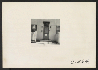 [recto] Sacramento, Calif.--Rooming house in the Japanese section of town. Photograph taken two days prior to evacuation. ;  Photographer: Lange, Dorothea ;  Sacramento, California.