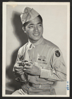 [recto] Pfc. Thomas Higa, 28-year-old Japanese-American veteran of the campaign in Italy and a proud member of the famous 100th Infantry ...