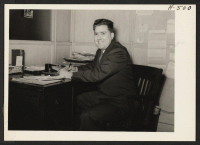 [recto] Ray Grow, Reports Officer of the Chicago Area Office. ;  Photographer: Mace, Charles E. ;  Chicago, Illinois.