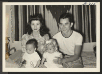 [recto] Pvt. Joe Watanabe and his family. Pvt. Watanabe left with the first group of inductees for Camp Blanding, Florida, May 1[?], 1944. ;  Rivers, Arizona.