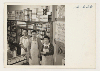 [recto] Fed Toguri, owner, Masachi Hori, who works for Fred, and June Toguri, Fred's sister, are shown at the front counter ...