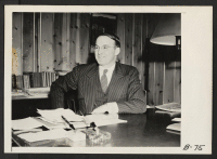[recto] Klamath Falls, Oregon--Earl C. Reynolds, Executive Secretary of the Klamath Falls Chamber of Commerce. ;  Photographer: Albers, Clem ;  Newell, California.