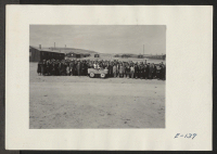 [recto] Funeral picture taken for Mr. J. Fukui. (See E-136) ;  Photographer: Parker, Tom ;  Heart Mountain, Wyoming.