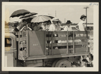 [recto] Closing of Jerome Center, Denson, Arkansas. Here we go again! A typical truck load of Japanese American residents of the ...