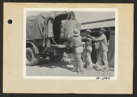 [recto] Poston, Ariz.--(Site 1)--Safe arrives for the post office at this War Relocation Authority center for evacuees of Japanese ancestry. ;  Photographer: Clark, Fred ;  Poston, Arizona.