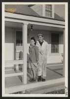 [recto] Bill and Betty Kobayashi, formerly of the Poston Relocation Center and Santa Ana, California, where they operated a chicken ranch. Bill and Betty are now working at a large poultry and hatchery farm in Montgomery County, Maryland, near Washington, D.C.