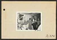 [recto] Poston, Ariz.--(Site No. 1)- Evacuees of Japanese ancestry are locating their baggage upon arrival at this War Relocation Authority center. ;  Photographer: Clark, Fred ;  Poston, Arizona.