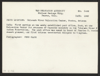 [verso] First service at the newly established post office, Poston, at the Relocation Center for evacuees of Japanese ancestry on the ...