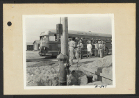 [recto] Poston, Ariz.--Arrival of evacuees of Japanese ancestry at this War Relocation Authority center. ;  Photographer: Clark, Fred ;  Poston, Arizona.