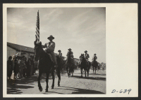 [recto] Mounted wardens who participated in the Harvest Festival Parade held at this center on Thanksgiving day. ;  Photographer: Stewart, Francis ;  Rivers, Arizona.