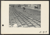 [recto] Parker, Ariz.--Thousands of concrete foundation blocks were cast for foundations of new living quarters for evacuees of Japanese ancestry at War Relocation Authority center on Colorado River Indian Reservation. ;  Photographer: Albers, Clem ;  Parker,