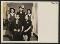 [recto] Mr. and Mrs. Thomas T. Sashihara with their daughters, Diane, 12; and Maureen, 11; and son, Tom Jr. Their former ...