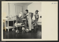 [recto] Closing of the Jerome Center, Denson, Arkansas. Hospital equipment being assembled in one of the wards where it will be sorted, labeled and sent to other centers where needed. ;  Photographer: Mace, Charles E. ;  Denson, Arkansas.