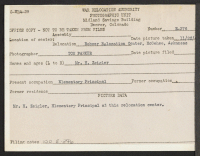 [verso] Mr. H. Zeigler, Elementary Principal at this relocation center. ;  Photographer: Parker, Tom ;  McGehee, Arkansas.