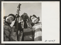 [recto] Three costumes that were worn in the Harvest Festival Parade held at this relocation center. ;  Photographer: Stewart, Francis ;  Newell, California.