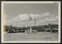 [recto] Dedication of the flag pole at the Stafford Elementary School conducted by the Boy Scouts of the Hunt troop. The Stafford School is one of two elementary schools in the Minidoka Relocation Center. ;  Hunt, Idaho.