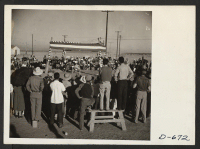 [recto] A wrestling tournament was held by the evacuees Thanksgiving day at this center. ;  Photographer: Stewart, Francis ;  Rivers, Arizona.