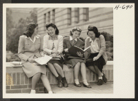 [recto] Michiko Kataoka, a freshman, and Meriko Hoshiyama, a junior, both from Manzanar (left to right in picture), with fellow students ...