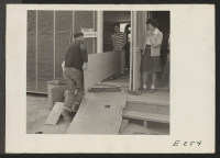 [recto] An exterior view of the Optometry clinic. ;  Photographer: Parker, Tom ;  Denson, Arkansas.