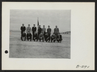 [recto] Married men, who have volunteered for service in the combat unit which is being formed by the army. Army volunteers at this center are known as Volunteers for Victory. ;  Photographer: Stewart, Francis ;  Topaz, Utah.