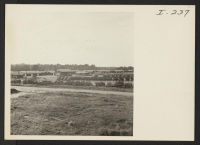 [recto] Closing of the Jerome Center, Denson, Arkansas. Panorama view of the Jerome Relocation Center. ;  Photographer: Iwasaki, Hikaru ;  Denson, Arkansas.