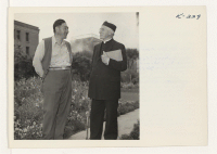 [recto] George Tanaka and Father A. Sterns at the San Francisco General Hospital. Mr. Tanaka and Father Sterns, philosophers and friends ...