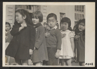 [recto] Many children of Japanese ancestry attended Raphael Weill public school, Geary and Buchanan Streets, prior to evacuation. This scene shows ...