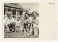 [recto] Jim Miyano's father, Ishitaro Miyano, founder of the chicken ranch at Route 4, Box 114, Petaluma, California, with his son, Jim, and his daughter Lily, and his grandson, Tommy Ozaki, taken in front of the Miyano home. All were former residents of Granada.