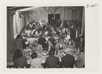 [recto] Lunch time, cafeteria style, at the Santa Anita Assembly Center where many thousands of evacuees of Japanese ancestry are temporarily housed pending transfer to War Relocation Authority Centers where they will spend the duration. ;  Photographer: Albers