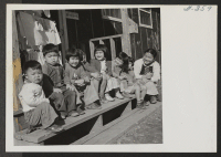 [recto] Young children at Jerome Relocation Center. ;  Photographer: Van Tassel, Gretchen ;  Denson, Arkansas.