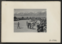 [recto] Manzanar, Calif.--Memorial Day services at Manzanar, a War Relocation Authority center where evacuees of Japanese ancestry will spend the duration. American Legion members and Boy Scouts participated in the services. ;  Photographer: Stewart, Francis
