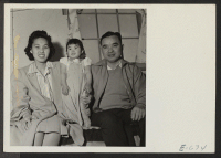 [recto] Dave and Ruth Natike with their daughter Judy. Dave is block manager and his wife, Ruth, is office attendant at ...