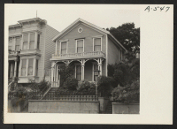 [recto] Homes of residents of Japanese ancestry on Bush Street. Occupants were evacuated and will be housed in War Relocation Authority centers for the duration. ;  Photographer: Lange, Dorothea ;  San Francisco, California.
